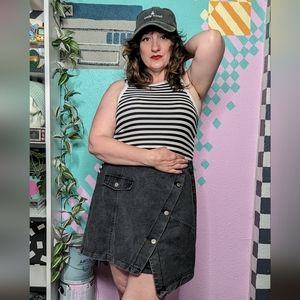 Asymmetrical button up denim mini skirt.